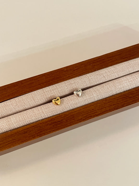 Charm heart piercing