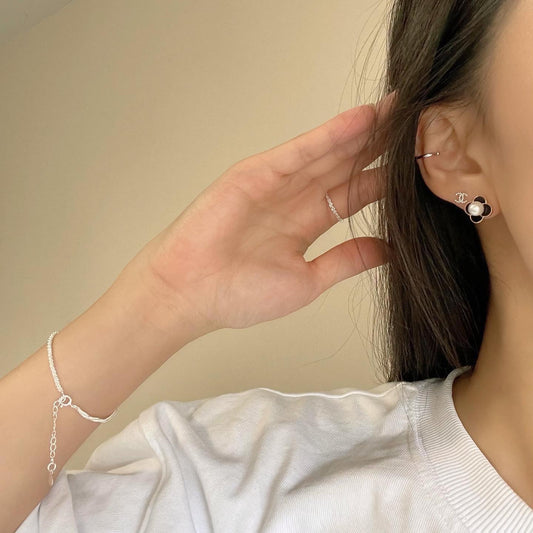 Black cotton flower earrings