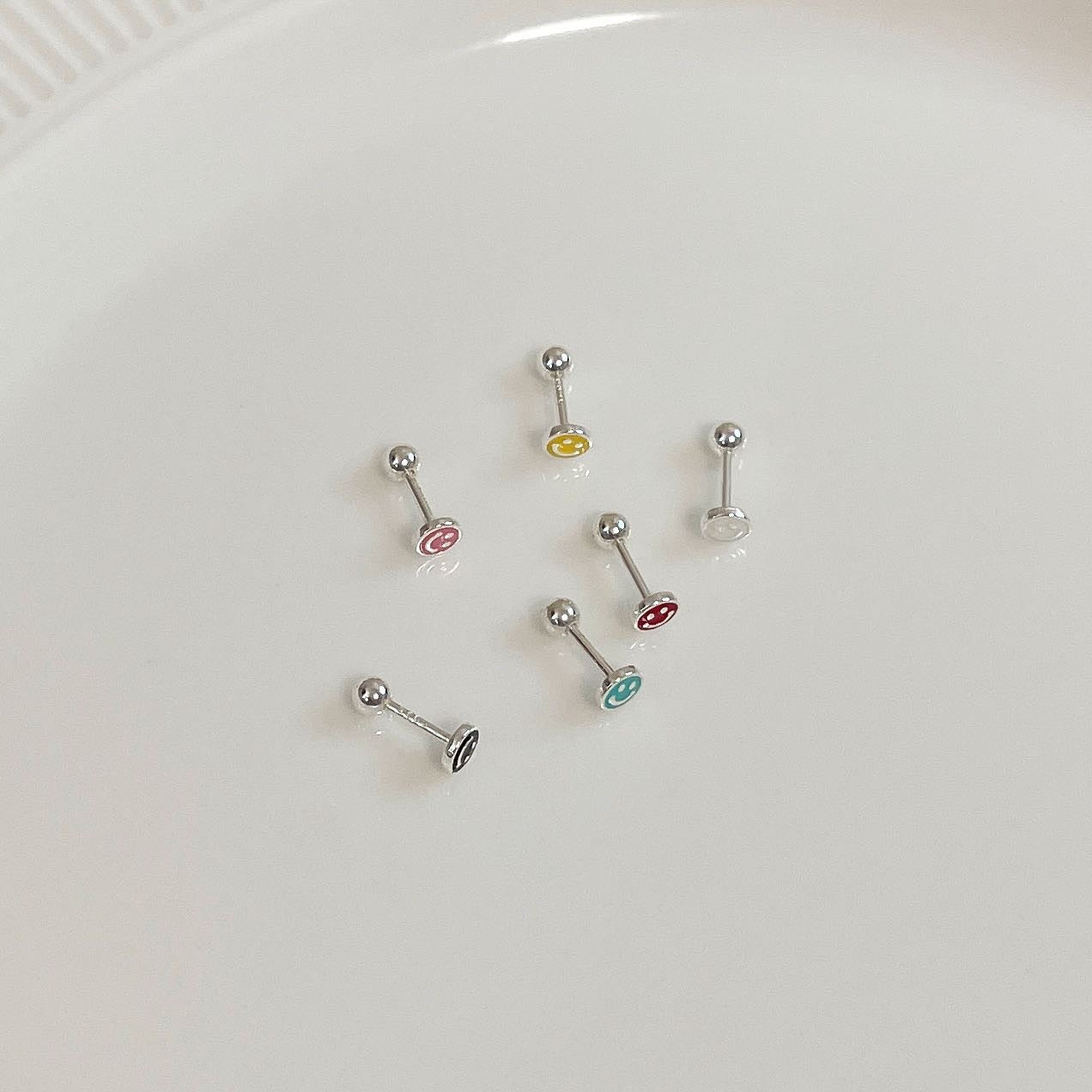 Sunny smile piercing