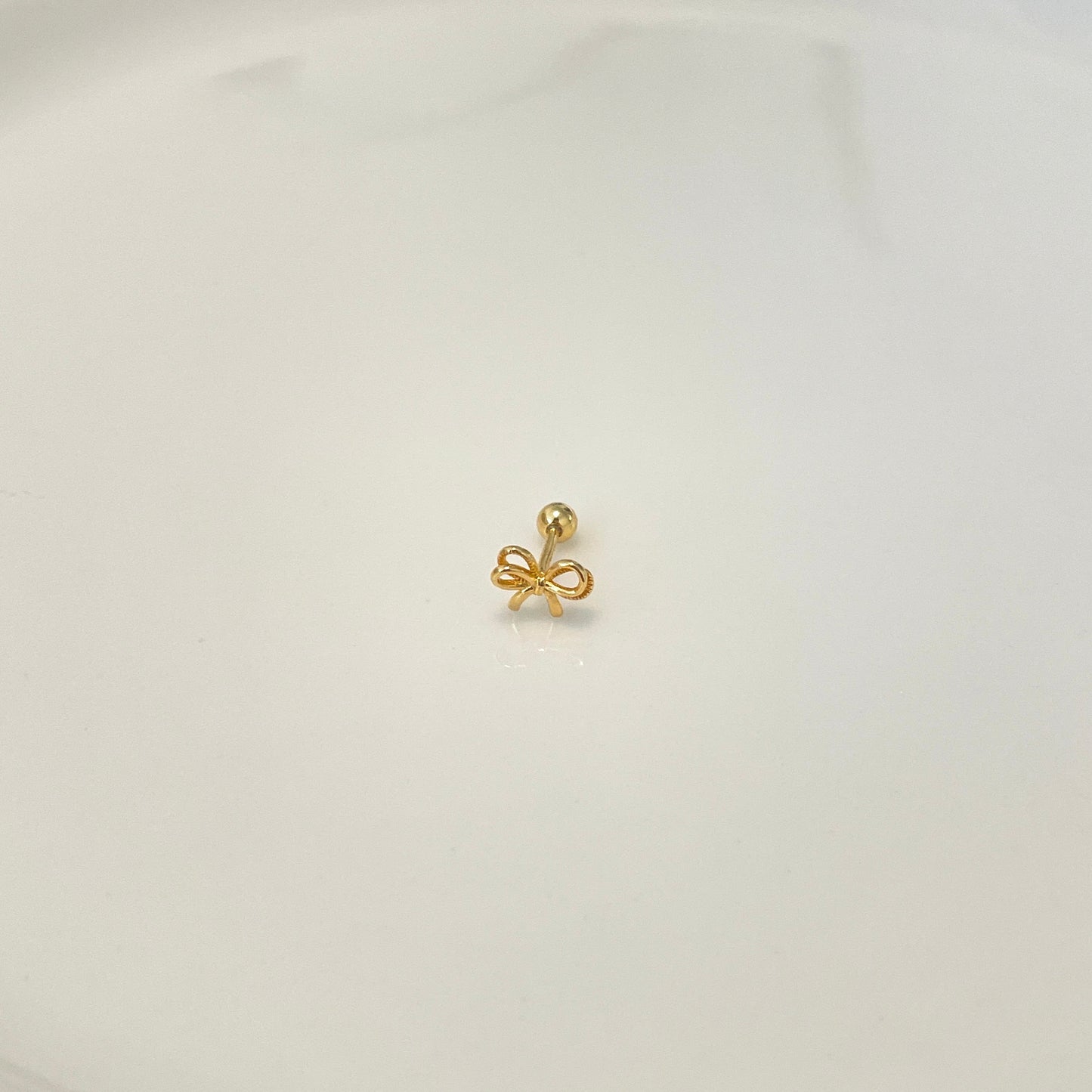 Glimmered twist piercing