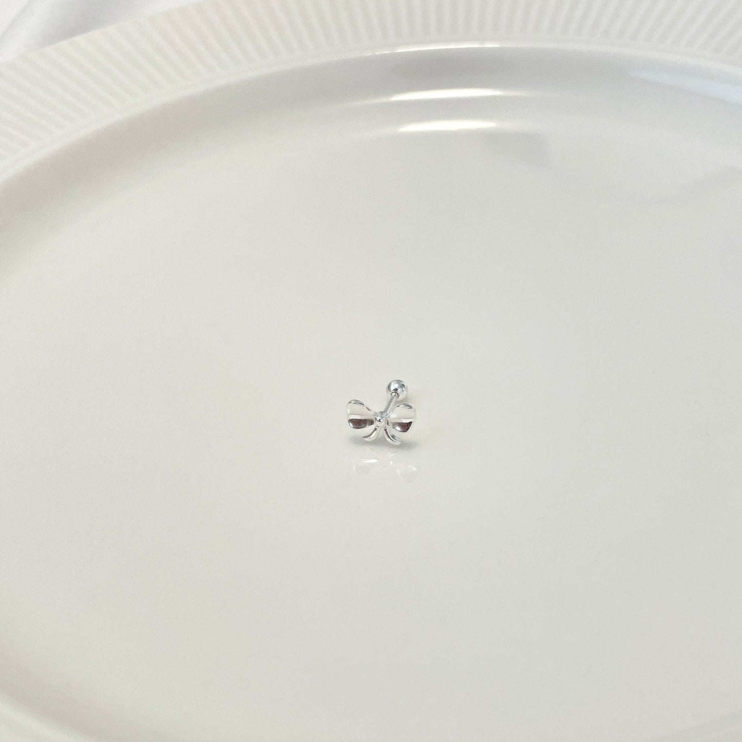 Golden snitch piercing