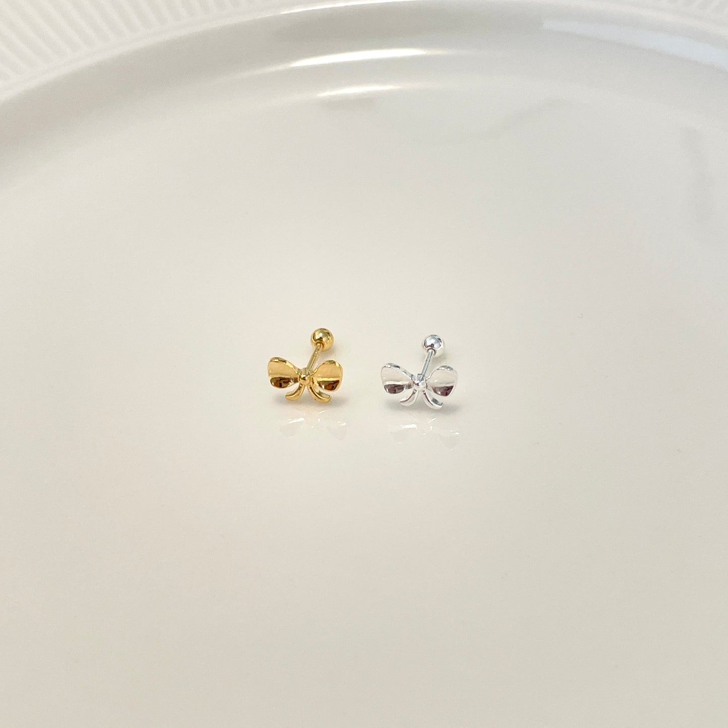 Golden snitch piercing