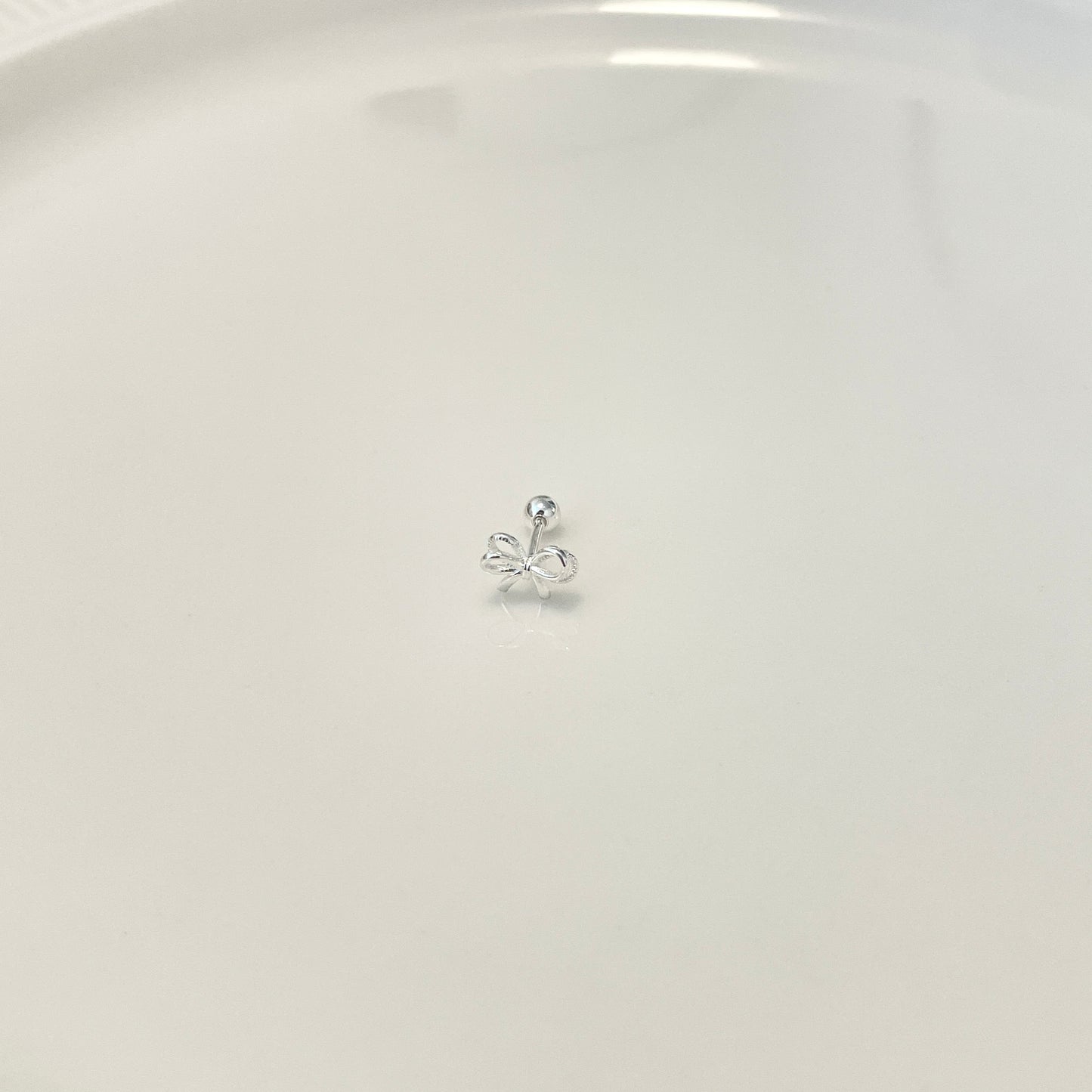 Glimmered twist piercing