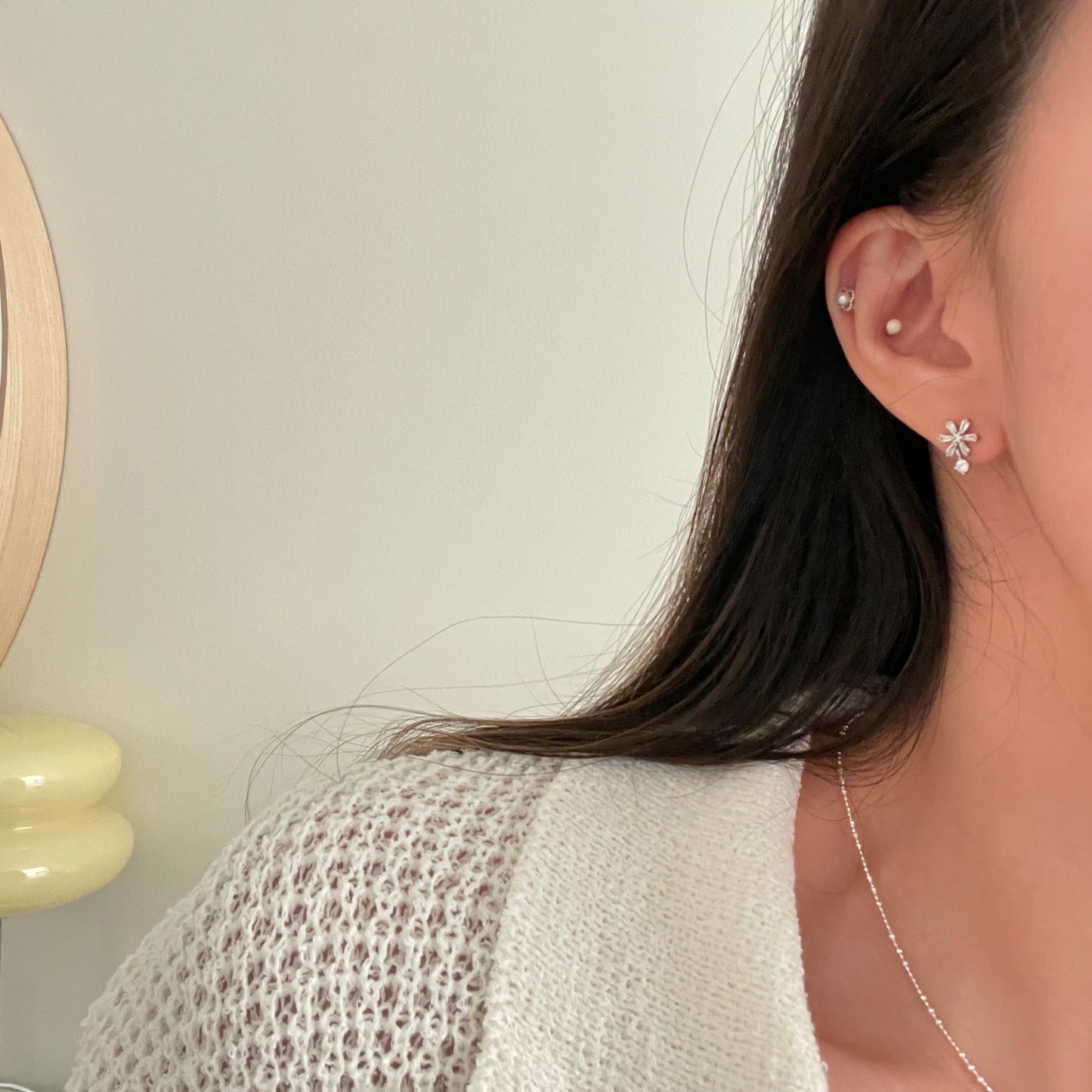 Pearlie flower piercing