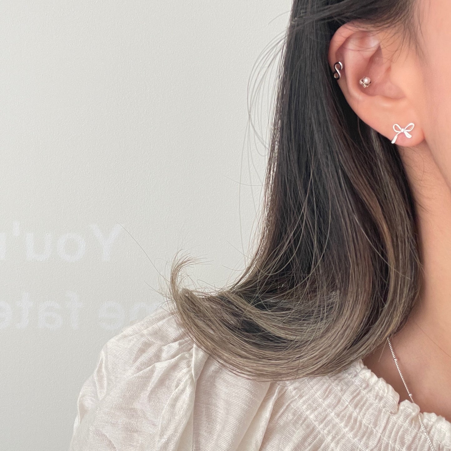 Pearlie flower piercing