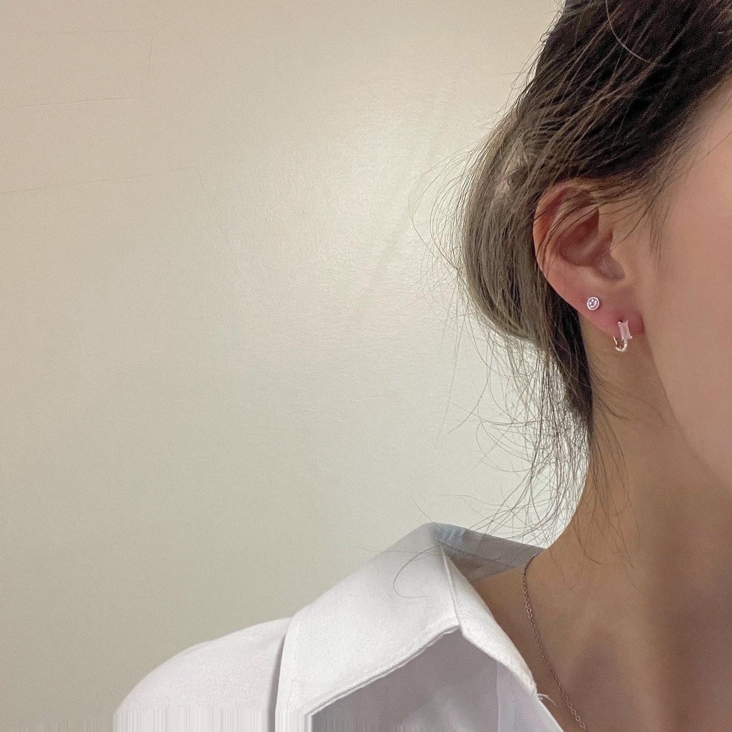 Sunny smile piercing