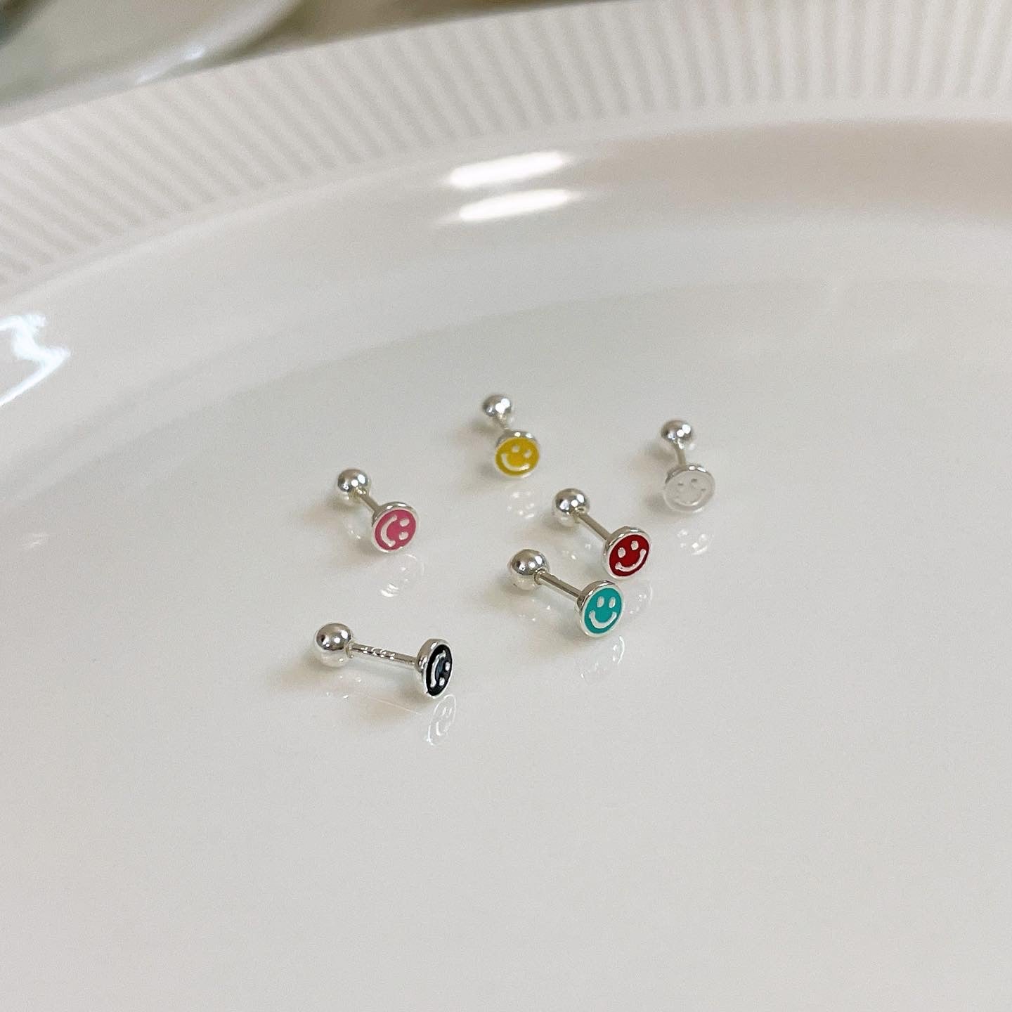 Sunny smile piercing