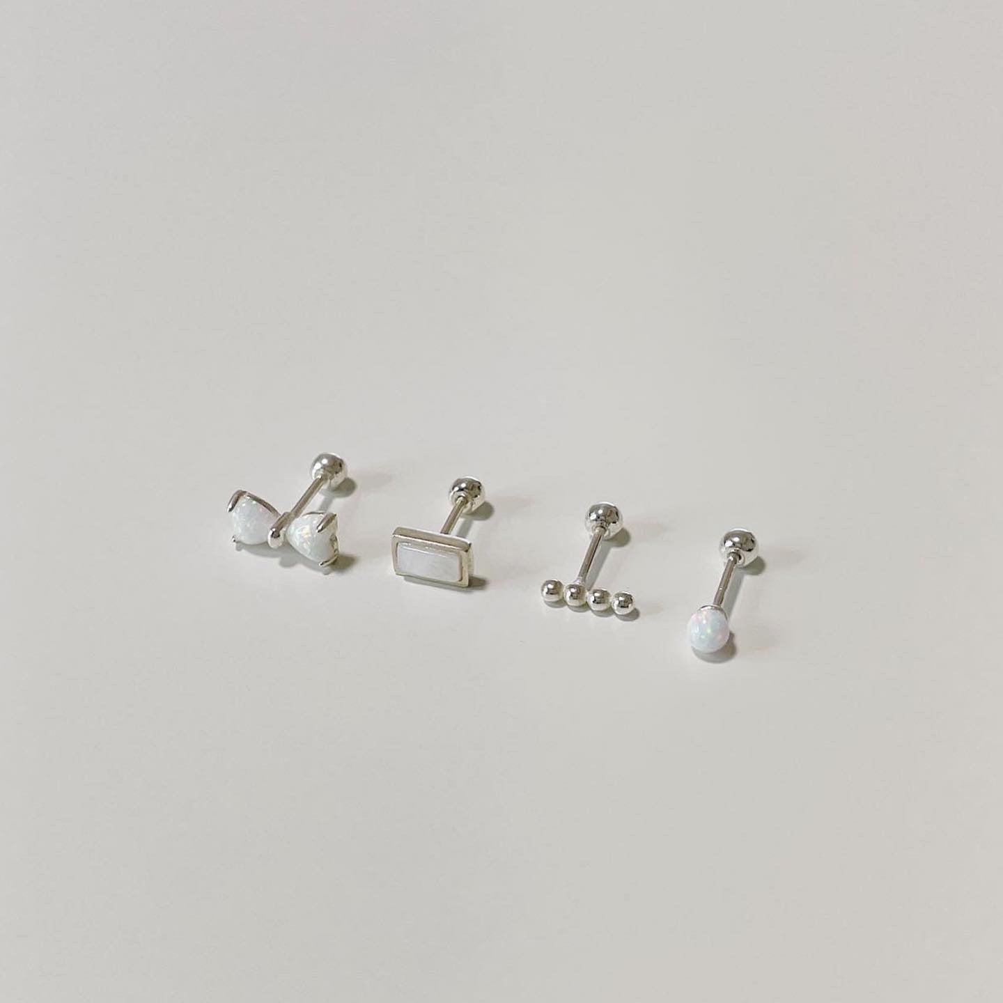 Opal ribbon piercing