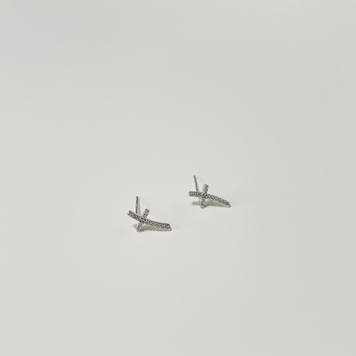 Chrome saint earrings